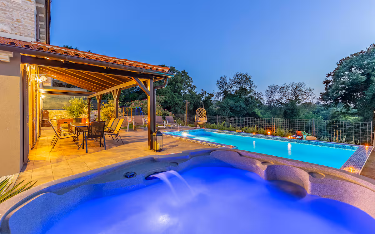 Pool and jacuzzi at night